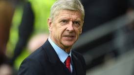 Arsene Wenger leaves the door open to approach from England