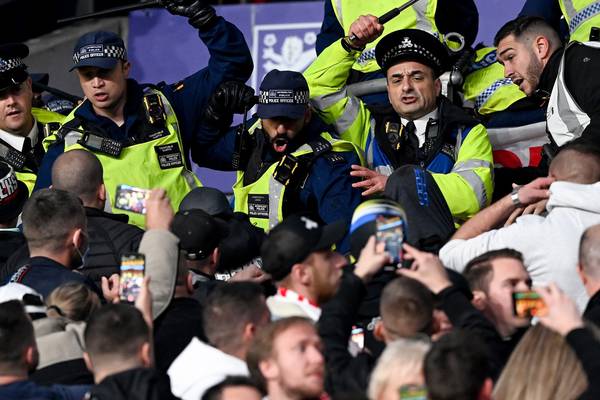 Police in England defend tactics in violent clash with Hungary fans
