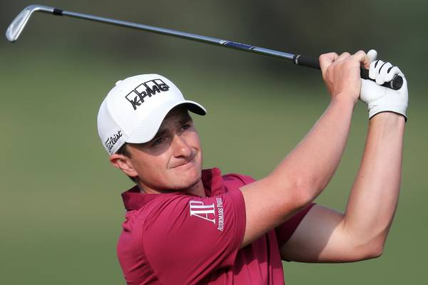 Paul Dunne slips back after third round in Doha