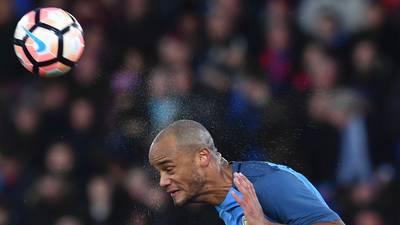 Vincent Kompany returns to guide Manchester City into fifth round