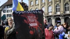 Nestlé justifies staying in Russia as criticism mounts