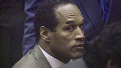 OJ Simpson in the courtroom as the "not guilty" verdict is announced
