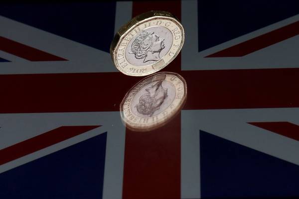 Sterling drops after poll showing risk of hung parliament