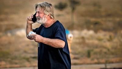 Police investigating Rust film set shooting seek material from Alec Baldwin’s phone