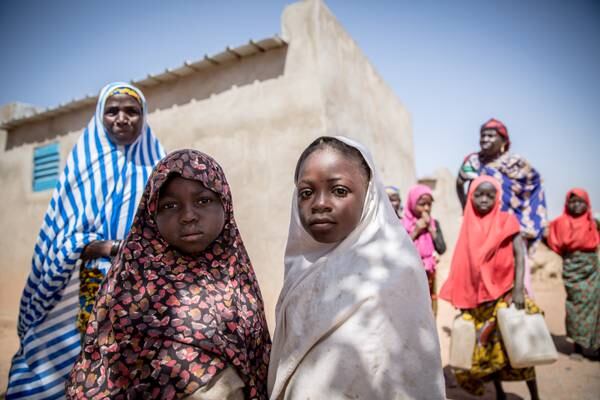 Nigerian refugees watch from neighbouring countries as election approaches