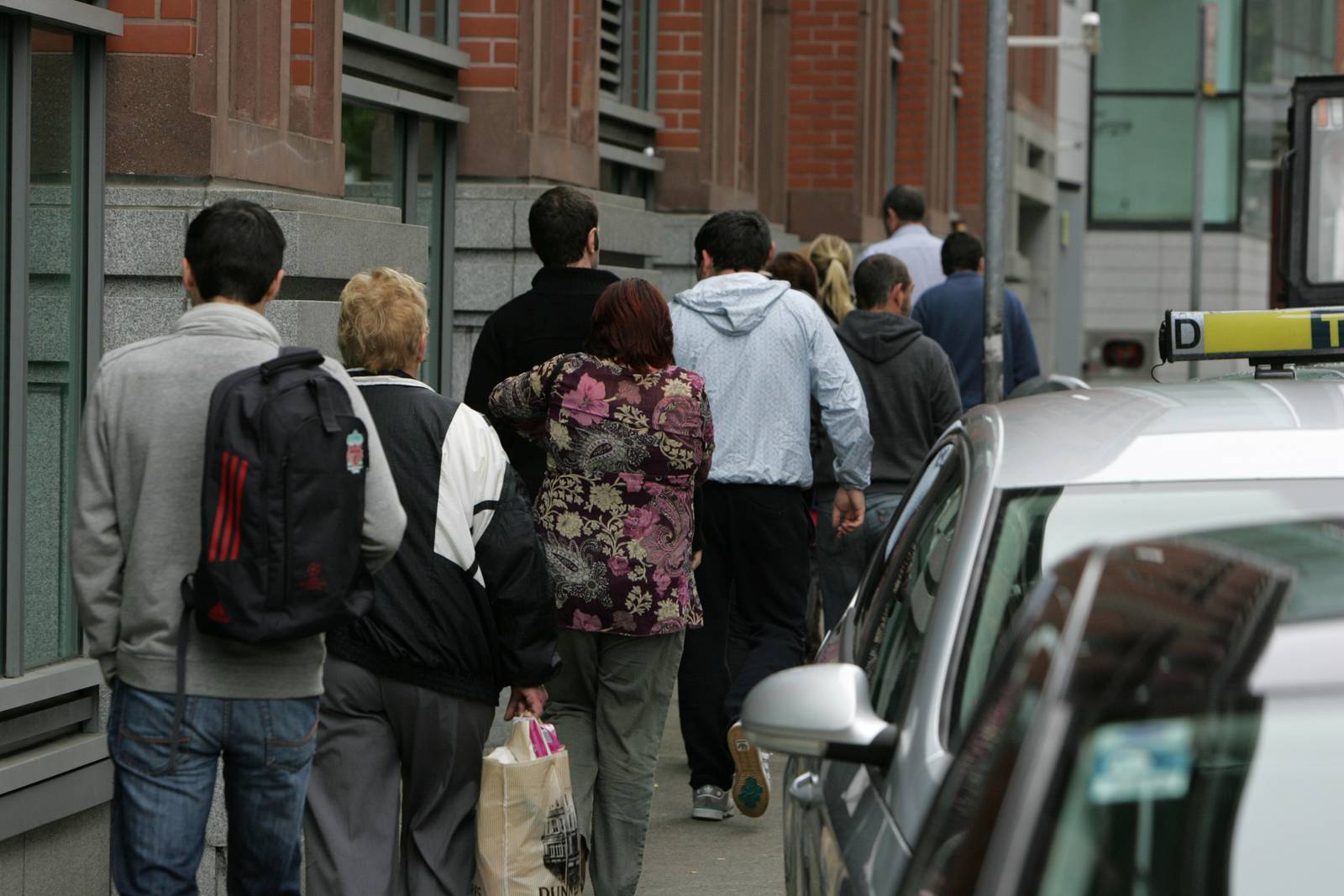 08/09/2011.....news/finance....archive....
A queue for unemployment benefit outside Bishop Street Social Welfare Office in Dublin this morning.   Photograph: Frank Miller  /	THE IRISH TIMES

dole unemployment assistance labour laid off jobless jobseekers
