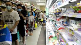 Taiwan warns against panic-buying as new Covid-19 rules kick off