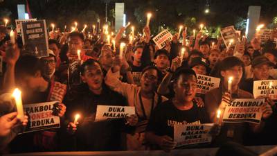 Vigil held for 125 victims of Indonesia stadium crush