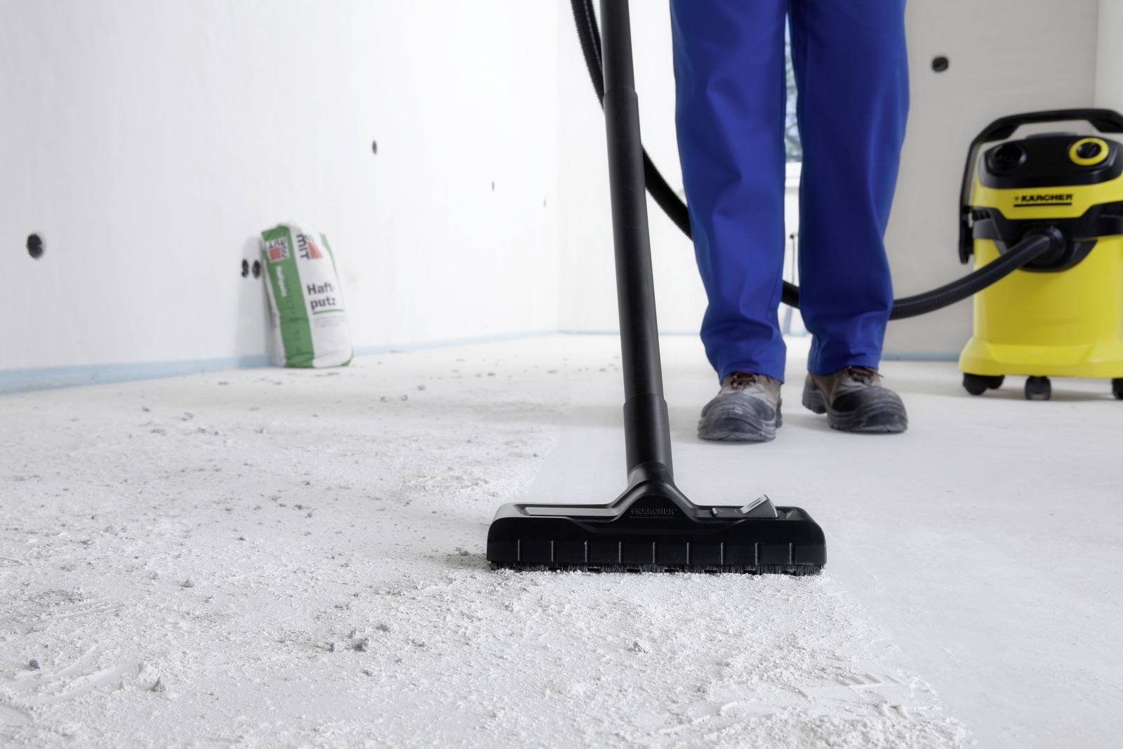 Karcher wet and dry vacuum cleaner being used in a garage