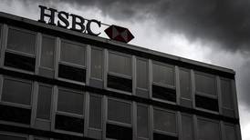 HSBC’s Swiss deposits drop by almost half