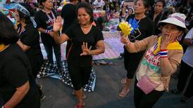 Thai protesters move on ministries as interest  rates cut in response to fall in exports