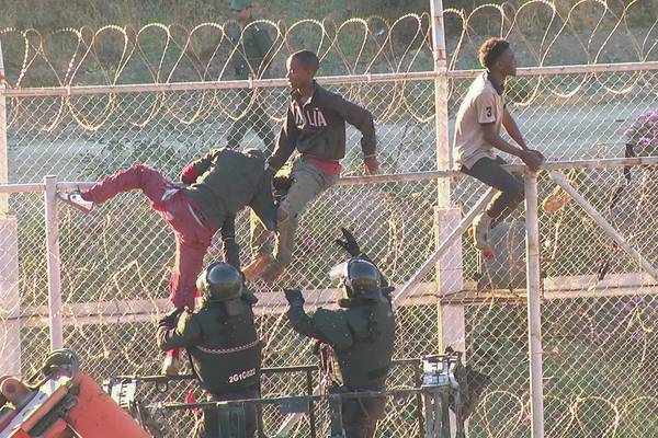 Hundreds storm border fence into Spain’s north Africa enclave of Ceuta