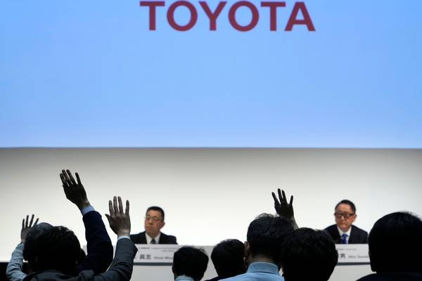 Regulators raid Toyota offices over safety scandal, sending stock down