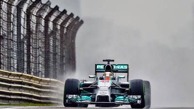 Lewis Hamilton slips and slides his way to pole in China