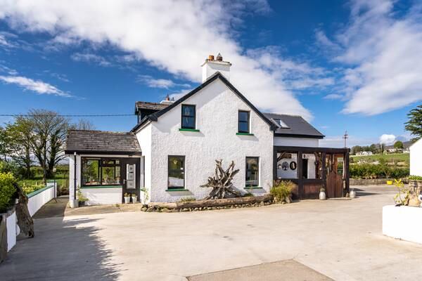 Quaint Donegal period home at the edge of Lough Foyle with eco glamping business for €365,000