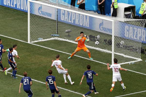 Japan squeeze through to last-16 despite Poland defeat