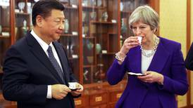 Theresa May stresses close bond with China in Xi Jinping talks