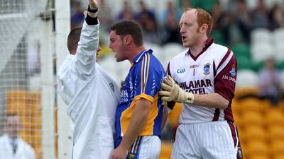 Men in white coats. The strange life of the GAA umpire