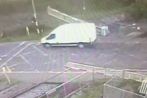 Video shows van smashing through Galway level crossing