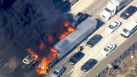 California firefighters battle mountain highway blaze