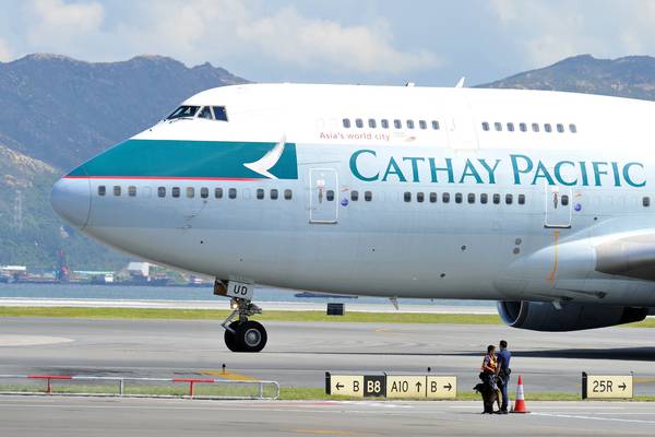 Cathay Pacific cuts earnings outlook amid Hong Kong unrest
