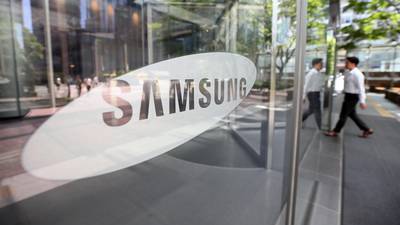 Samsung Electronics shares slide after reporting sharply lower profit