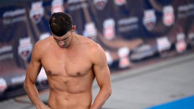 Michael Phelps makes pedestrian return to the pool