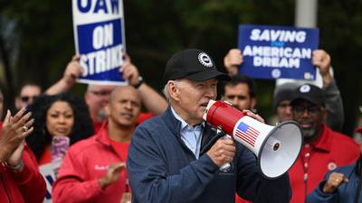 Biden becomes first modern president on picket line as he backs Michigan car workers