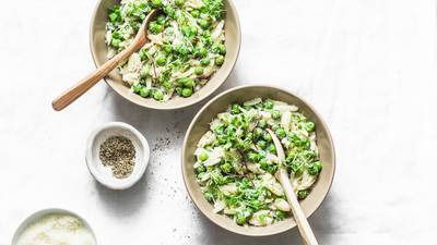 Olive oil is at the heart of this rustic soup-stew of orzo, peas, Parmesan and mint