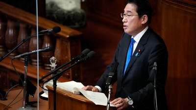 Japanese prime minister pledges to push military build-up under new security strategy