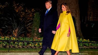 Melania Trump wows in a canary yellow cape – but who is it a dig at?