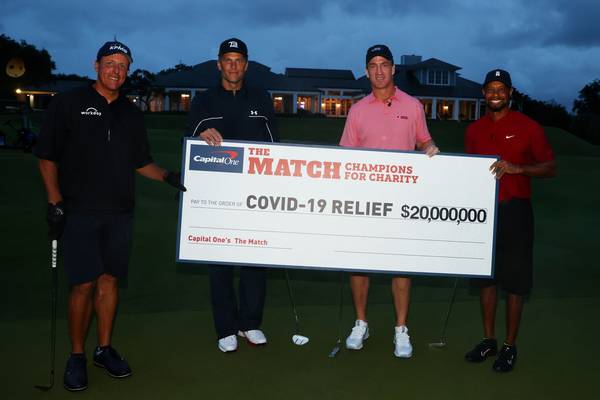 Tiger Woods and Peyton Manning hold their nerve in $20m Covid-19 charity match