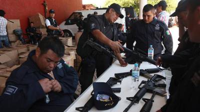 Fear and distrust as Mexico brings drug vigilantes in from the cold