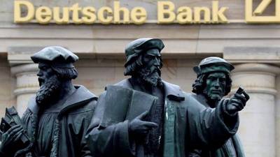 Deutsche Bank beats on profit, warns on capital buffers