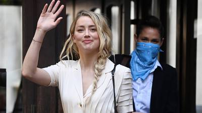 Amber Heard says ex-husband Johnny Depp threatened to kill her