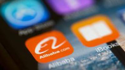 Alibaba trims sales estimates as China economy slows