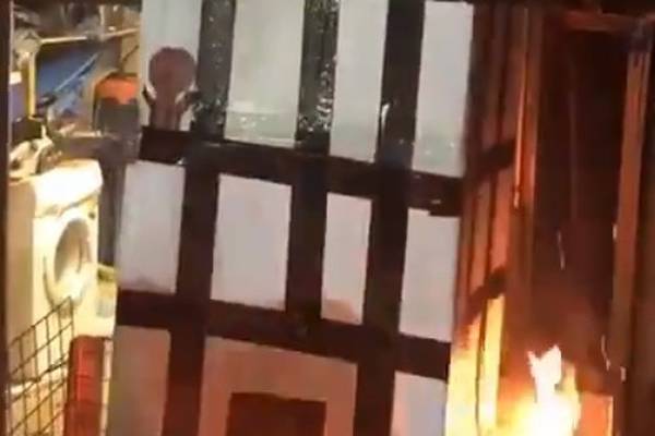 Police search house over Grenfell bonfire video