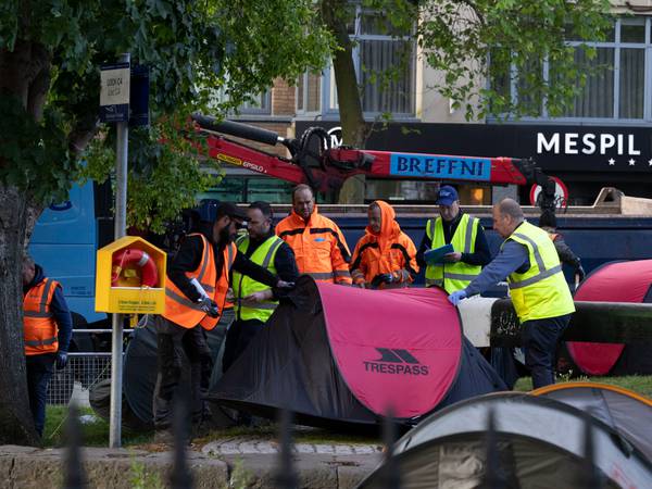 Tents housing asylum seekers cleared from Dublin's Grand Canal