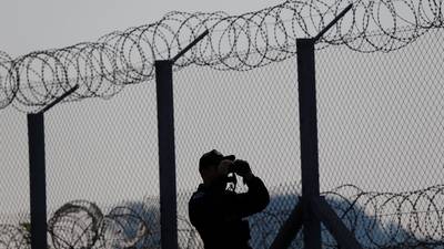 Hungary builds new border fence as rights groups protest