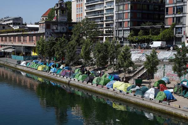 France: Minister and mayor trade barbs over migrant crisis