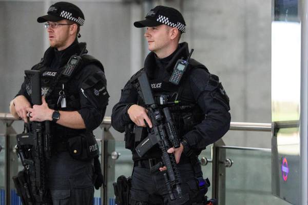 London Tube attack: Two men in custody as terror threat level is downgraded