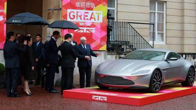 Aston Martin unveils first electric car – the RapidE
