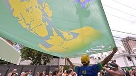 Thousands line streets to bid final farewell to Pele in Santos