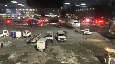Two planes collide at Toronto airport sparking small fire
