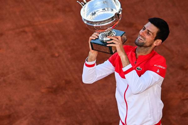 Novak Djokovic fights back from the brink to win second French Open title