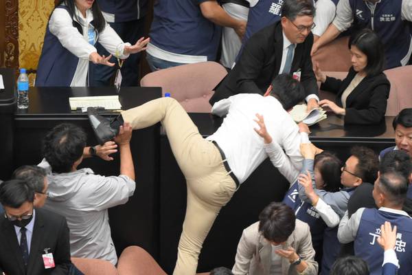 Taiwan's parliament comes to blows as lawmakers tussle over reforms