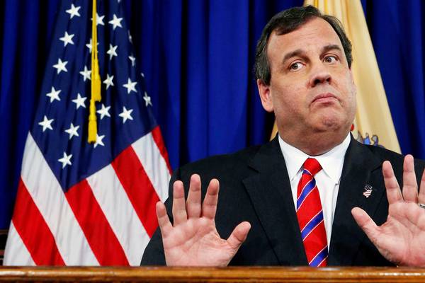 US governor Chris Christie lounges on beach he closed to public