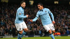 Tevez charged over driving offences