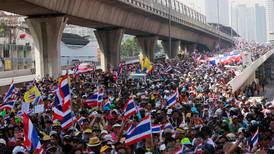 Protesters swarm in Thai capital to demand Yingluck resigns