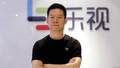Chinese tech tycoon sticks to electric cars as he quits troubled LeEco